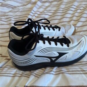 Black, White and brown mizuno shoes